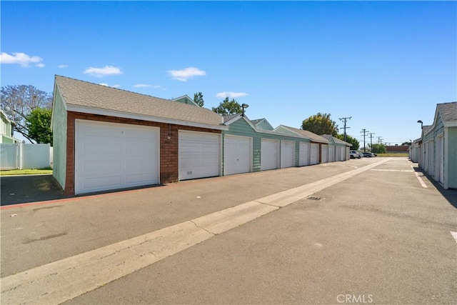 5640 Riverside Dr Unit 119, Chino, CA 91710 - view of asphalt road with community garages