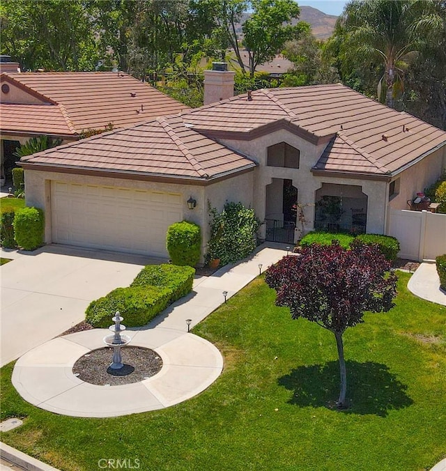 26629 Calle Gregorio, Menifee, CA 92585 - view of front of property featuring stucco siding, a tiled roof, concrete driveway, and an attached garage