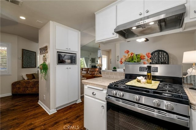 26629 Calle Gregorio, Menifee, CA 92585 - kitchen with appliances with stainless steel finishes, ventilation hood, tile countertops, dark wood-type flooring, and white cabinetry