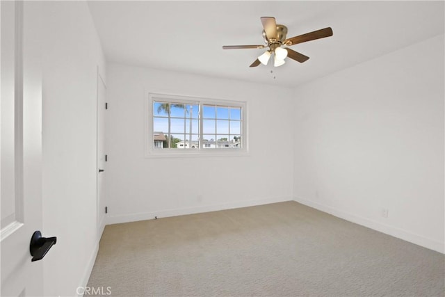 4664 Fir Ave, Seal Beach, CA 90740 - empty room with light colored carpet, baseboards, and ceiling fan