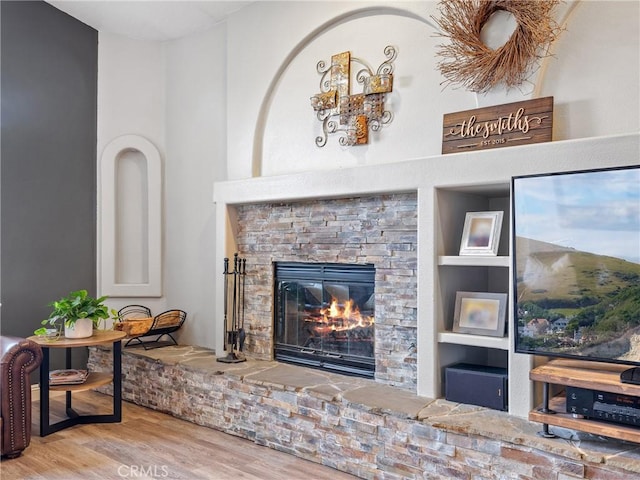 13290DR Country Club Dr, Victorville, CA 92395 - detailed view of a stone fireplace and wood finished floors