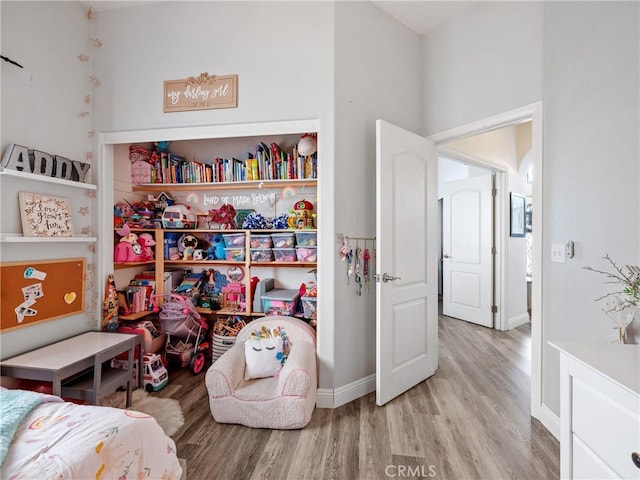 13290DR Country Club Dr, Victorville, CA 92395 - bedroom with wood finished floors and baseboards