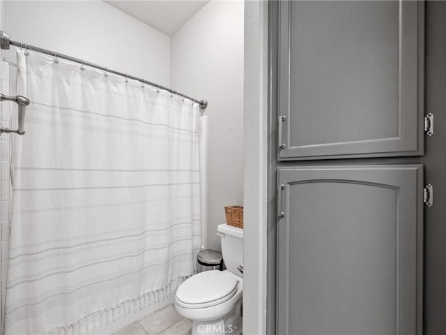 13290DR Country Club Dr, Victorville, CA 92395 - bathroom featuring toilet, curtained shower, and tile patterned floors