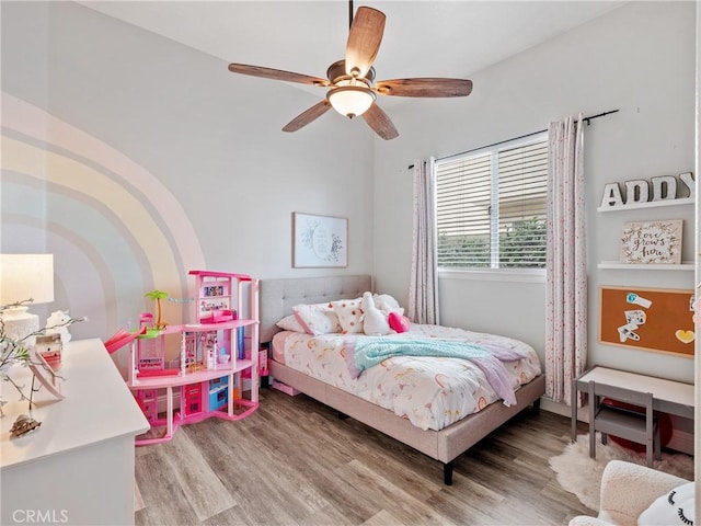13290DR Country Club Dr, Victorville, CA 92395 - bedroom featuring light wood-style floors and ceiling fan