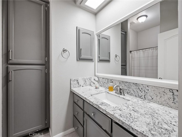 13290DR Country Club Dr, Victorville, CA 92395 - bathroom with vanity and baseboards