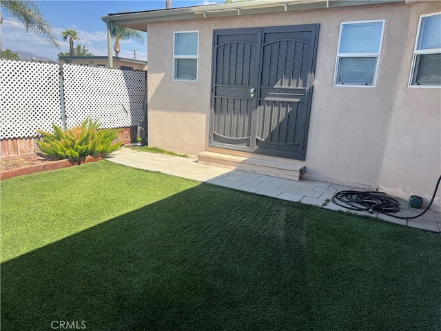 615 S Palm Ave Unit D, Hemet, CA 92543 - doorway to property with stucco siding