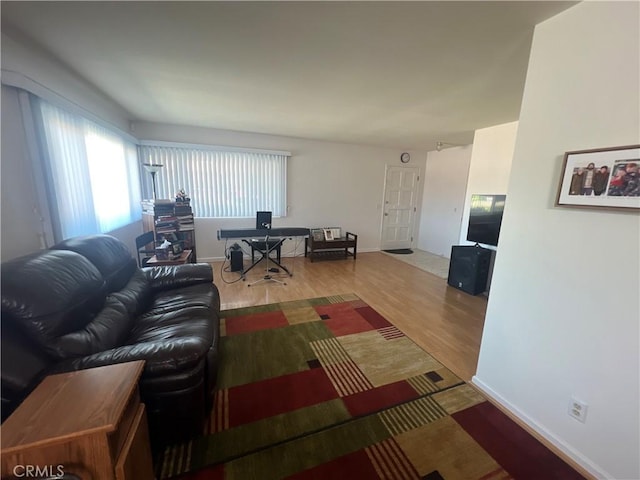 615 S Palm Ave Unit D, Hemet, CA 92543 - living area with wood finished floors, baseboards, and an office area
