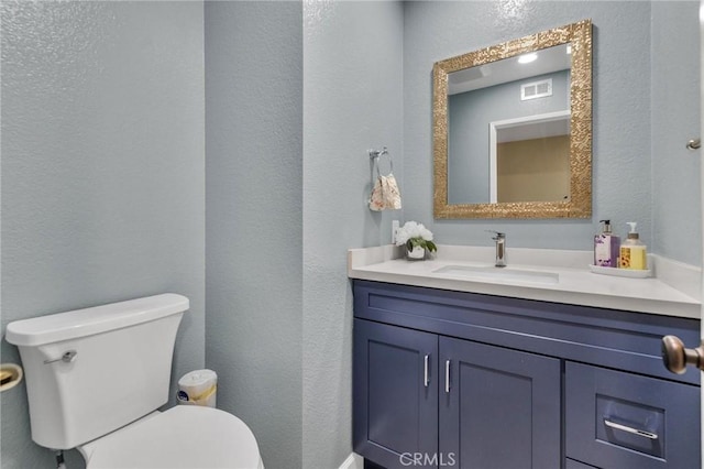 21020 Bryan Cir, Walnut, CA 91789 - half bath featuring toilet, vanity, and a textured wall