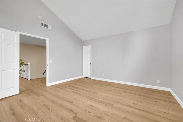 21020 Bryan Cir, Walnut, CA 91789 - empty room with vaulted ceiling, light wood finished floors, and baseboards
