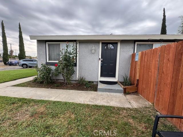 3400 Glasgow Cir, Riverside, CA 92503 - view of front of home with stucco siding