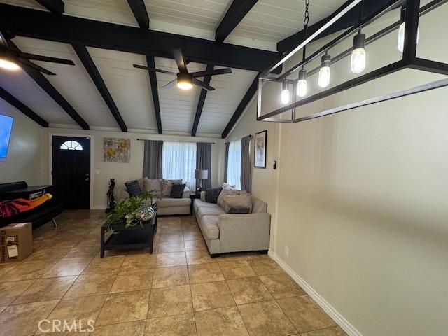 3400 Glasgow Cir, Riverside, CA 92503 - living room featuring a ceiling fan, baseboards, and light tile patterned flooring