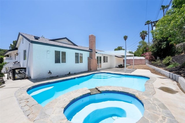 23125 Covello St, West Hills, CA 91307 - view of pool featuring a patio area and a pool with connected hot tub