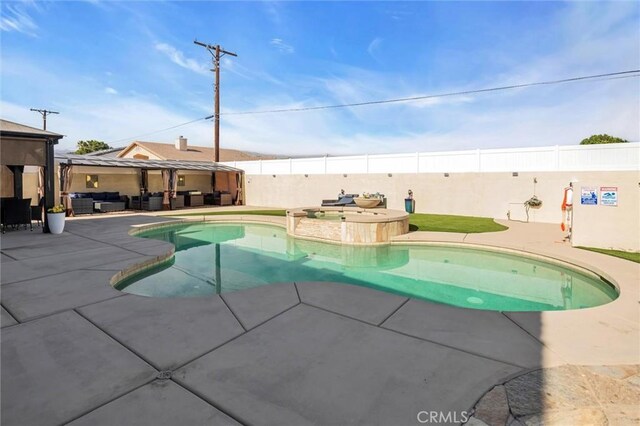 31780 Sierra Del Sol, Thousand Palms, CA 92276 - view of swimming pool with an outdoor hangout area, a fenced backyard, a patio, and a pool with connected hot tub