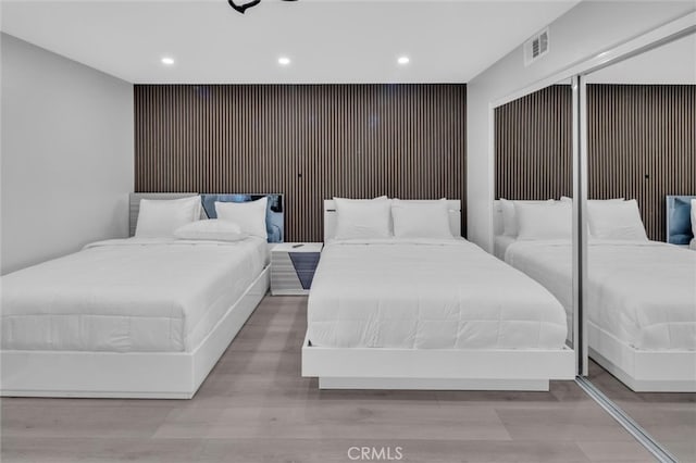 31780 Sierra Del Sol, Thousand Palms, CA 92276 - bedroom featuring recessed lighting, wood finished floors, and an accent wall
