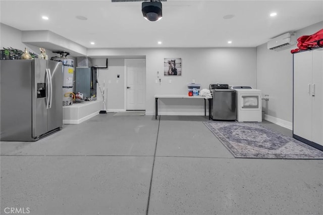 31780 Sierra Del Sol, Thousand Palms, CA 92276 - garage featuring stainless steel fridge with ice dispenser, a wall mounted air conditioner, baseboards, recessed lighting, and washer and clothes dryer