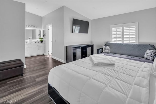 31780 Sierra Del Sol, Thousand Palms, CA 92276 - bedroom featuring lofted ceiling, dark wood-style floors, baseboards, and ensuite bathroom