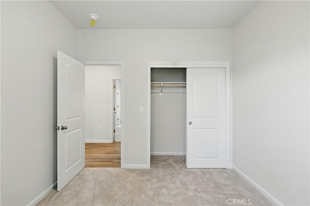 428 Oleander Ct, Chowchilla, CA 93610 - unfurnished bedroom with carpet floors, baseboards, and a closet