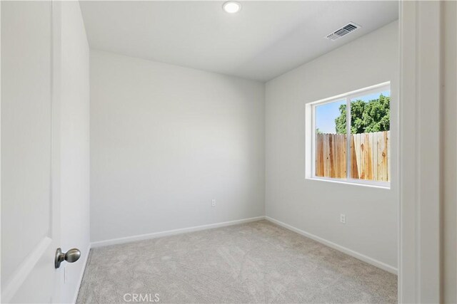 428 Oleander Ct, Chowchilla, CA 93610 - empty room featuring carpet, baseboards, and recessed lighting