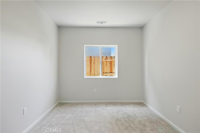 428 Oleander Ct, Chowchilla, CA 93610 - carpeted empty room with baseboards