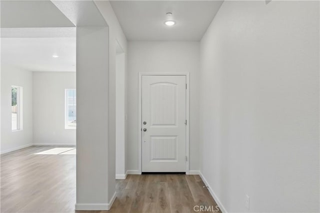 428 Oleander Ct, Chowchilla, CA 93610 - corridor with wood finished floors and baseboards