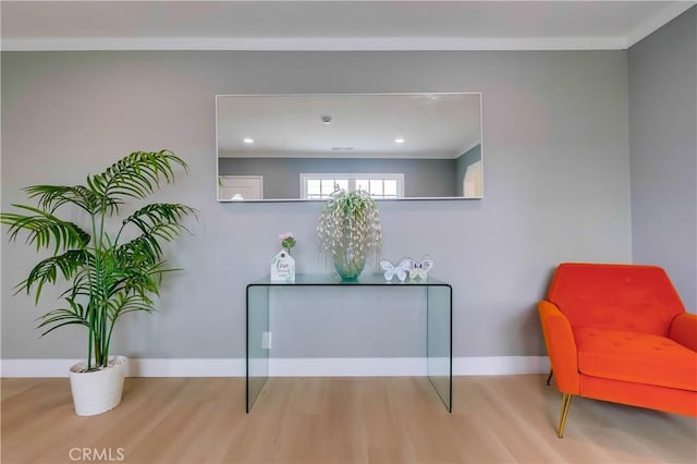 2124 Baltic Ave, Long Beach, CA 90810 - living area featuring wood finished floors, baseboards, crown molding, and recessed lighting