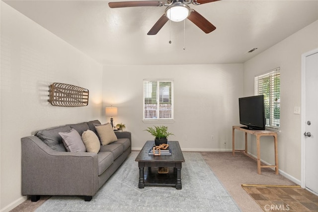 1170 Hobart St, Chico, CA 95926 - carpeted living room with ceiling fan and baseboards