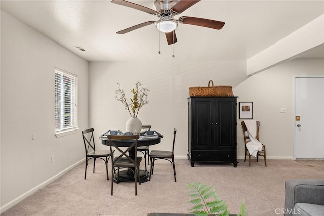 1170 Hobart St, Chico, CA 95926 - dining area featuring light colored carpet, baseboards, and ceiling fan