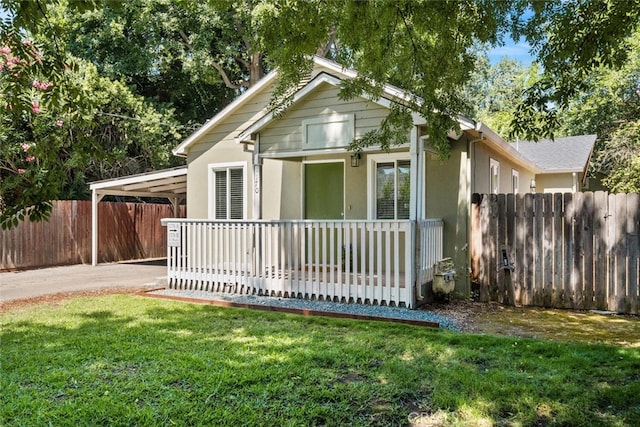 1170 Hobart St, Chico, CA 95926 - bungalow-style house featuring an attached carport, stucco siding, and concrete driveway