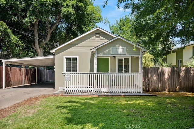 1170 Hobart St, Chico, CA 95926 - view of front of home with a carport, driveway, and stucco siding