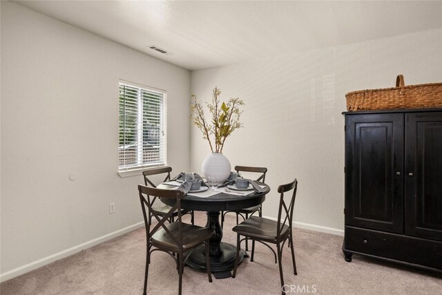 1170 Hobart St, Chico, CA 95926 - dining room with light carpet and baseboards