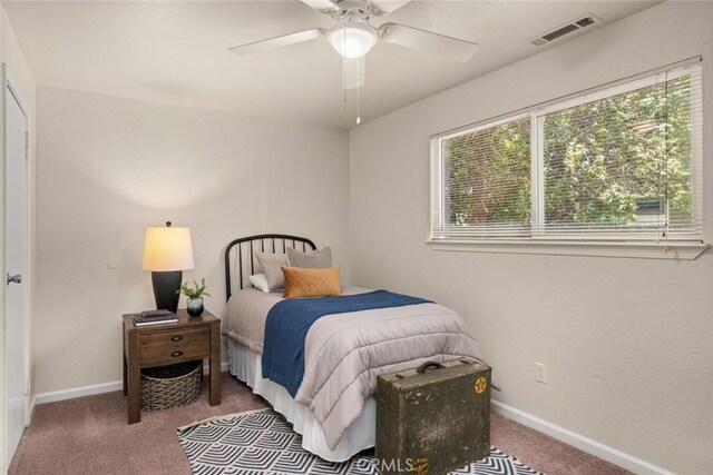 1170 Hobart St, Chico, CA 95926 - carpeted bedroom featuring baseboards and ceiling fan