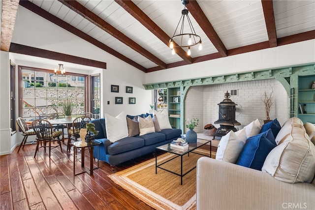 10 Strawberry Ln, San Juan Capistrano, CA 92675 - living area featuring a chandelier, hardwood / wood-style flooring, a wood stove, and wood ceiling