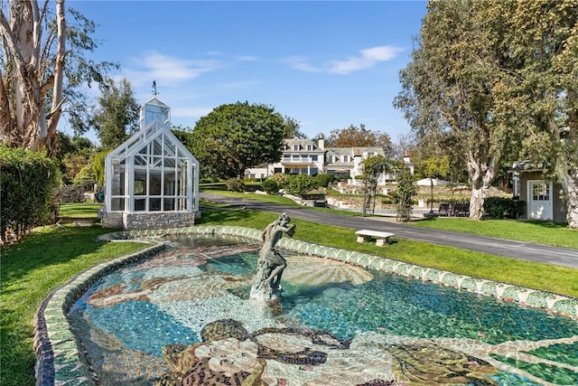 10 Strawberry Ln, San Juan Capistrano, CA 92675 - view of swimming pool featuring a lawn