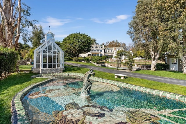 10 Strawberry Ln, San Juan Capistrano, CA 92675 - view of swimming pool featuring a yard