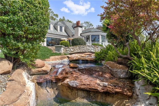 10 Strawberry Ln, San Juan Capistrano, CA 92675 - view of yard featuring a small pond