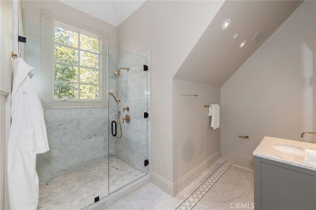 10 Strawberry Ln, San Juan Capistrano, CA 92675 - full bathroom with vaulted ceiling, a marble finish shower, vanity, and marble finish floors