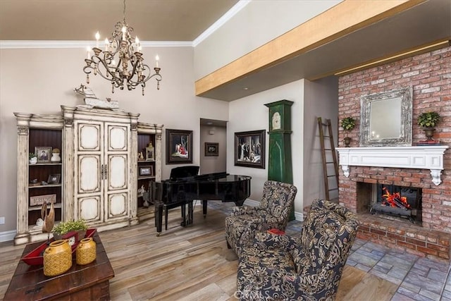 30026 Santiago Rd, Temecula, CA 92592 - living area featuring a fireplace, a chandelier, ornamental molding, and light wood-type flooring