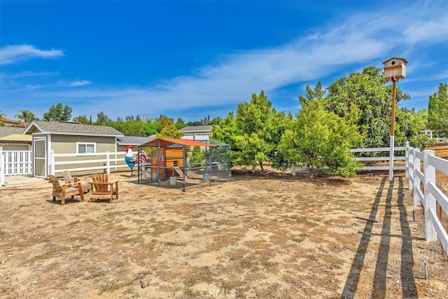 30026 Santiago Rd, Temecula, CA 92592 - view of yard featuring an outbuilding and exterior structure