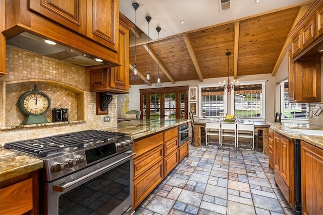 30026 Santiago Rd, Temecula, CA 92592 - kitchen with stainless steel range with gas stovetop, range hood, brown cabinetry, backsplash, and stone tile floors