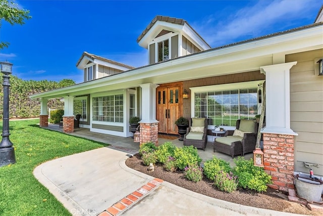 30026 Santiago Rd, Temecula, CA 92592 - view of exterior entry featuring covered porch and a yard