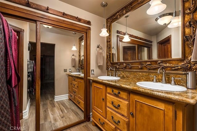 30026 Santiago Rd, Temecula, CA 92592 - bathroom with double vanity and wood finished floors