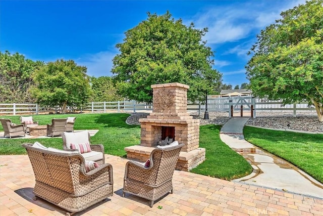 30026 Santiago Rd, Temecula, CA 92592 - view of patio with an outdoor living space with a fireplace