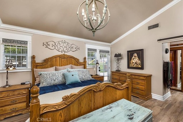 30026 Santiago Rd, Temecula, CA 92592 - bedroom featuring a chandelier, lofted ceiling, wood finished floors, and ornamental molding
