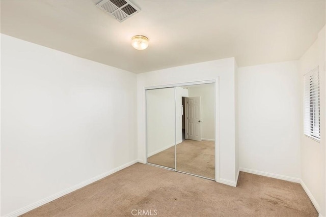 30026 Santiago Rd, Temecula, CA 92592 - unfurnished bedroom featuring light colored carpet and a closet