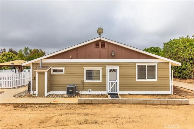 30026 Santiago Rd, Temecula, CA 92592 - rear view of property featuring board and batten siding