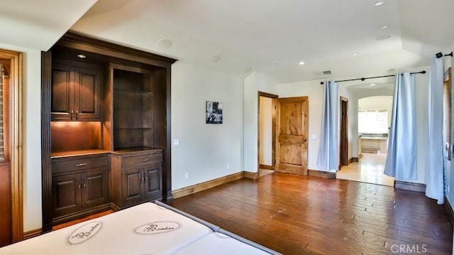 21822 Seacrest Ln, Huntington Beach, CA 92646 - unfurnished bedroom with dark wood-type flooring, baseboards, and recessed lighting
