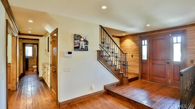 21822 Seacrest Ln, Huntington Beach, CA 92646 - foyer entrance with wood-type flooring, stairway, recessed lighting, and baseboards