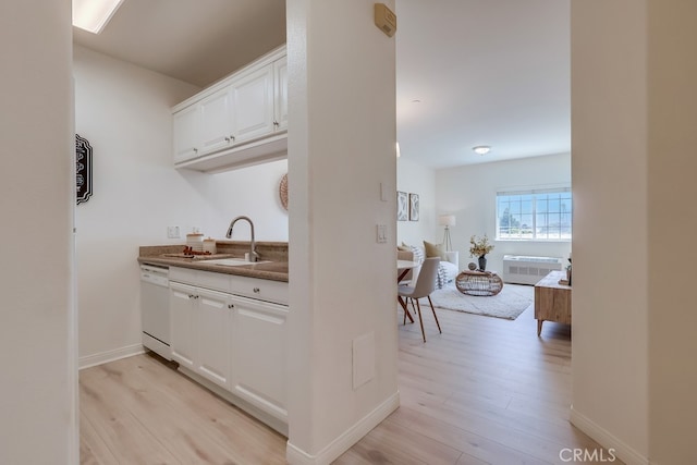 3120 Sepulveda Blvd Unit 312, Torrance, CA 90505 - bar featuring dishwasher, a sink, and light wood-type flooring