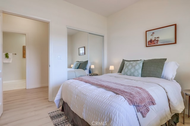 3120 Sepulveda Blvd Unit 312, Torrance, CA 90505 - bedroom with a closet, light wood-style flooring, and baseboards