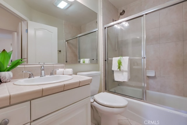 3120 Sepulveda Blvd Unit 312, Torrance, CA 90505 - full bath with toilet, vanity, enclosed tub / shower combo, and tile patterned flooring